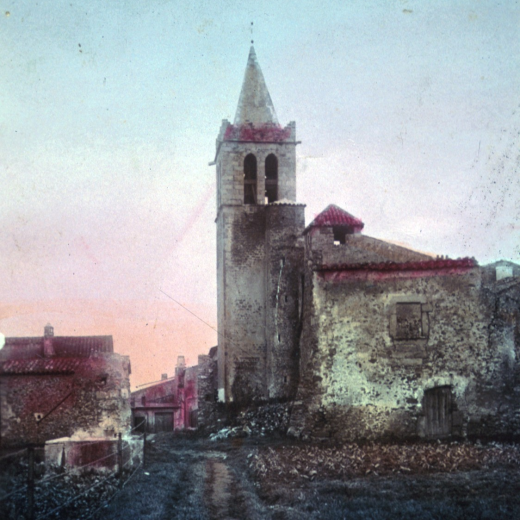 Antiga vista del campanar i la Torre Manresa de de l'avui Avinguda Sant Llorenç en una foto colorejada per l'autor.