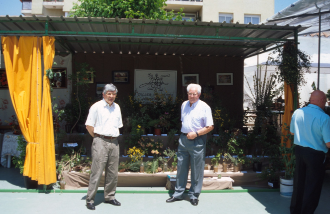 Exposició de plantes i flors a la Pista Jardí. En Juli Campeny i en Martí Tomàs davant de l'